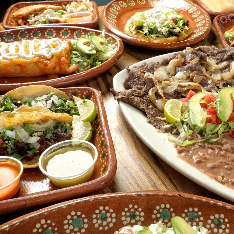 a variety of mexican food platters