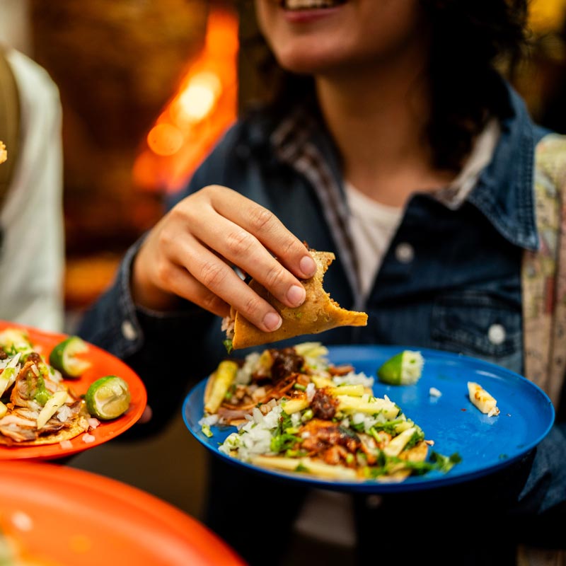 woman eating a taco